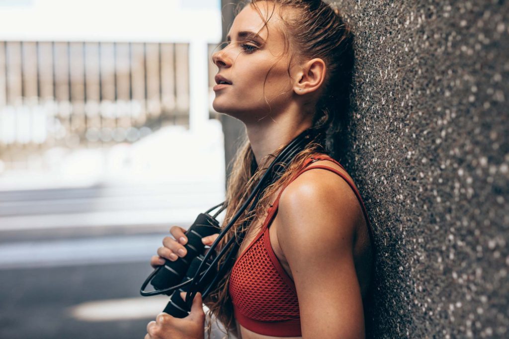 sweaty woman doing workout